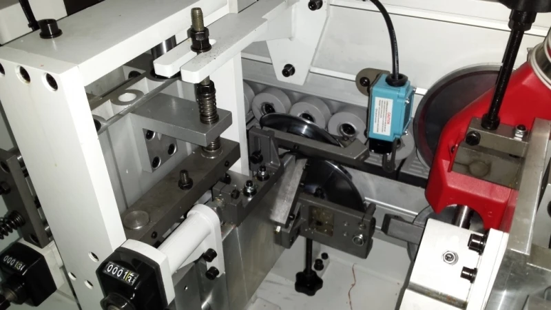 20-09-508 Automatinės kraštų užklijavimo staklės WOODLAND MACHINERY (naujos)