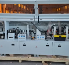 20-09-509 Kraštų užklijavimo staklės WOODLAND MACHINERY (su lankstų gręžimo funkcija)  (naujos)