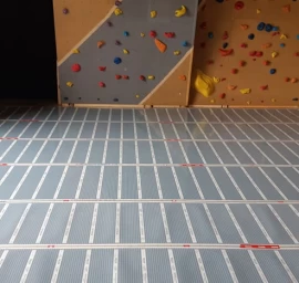Grindinis šildymas elektra (infraraudonųjų spindulių grindinis šildymas)