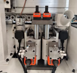 20-09-509 Kraštų užklijavimo staklės WOODLAND MACHINERY (su lankstų gręžimo funkcija)  (naujos)